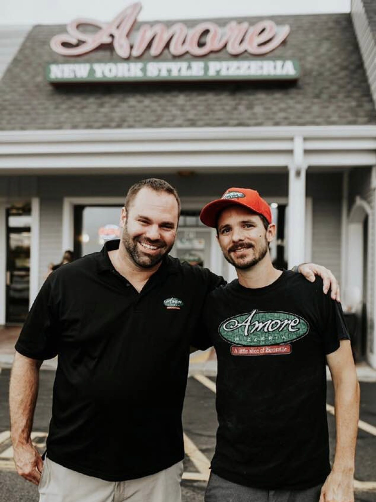 Chris and his brother Daniel in front of Amore Pizzeria in Zionsville